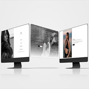 A photo of three iMac screens displaying shots from the Thoughts \x26 Days website.